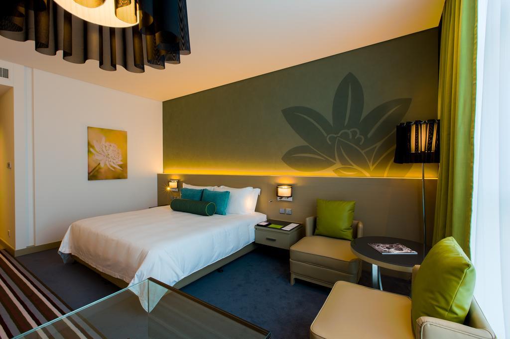 Отель Downtown Rotana Манама Экстерьер фото Deluxe room